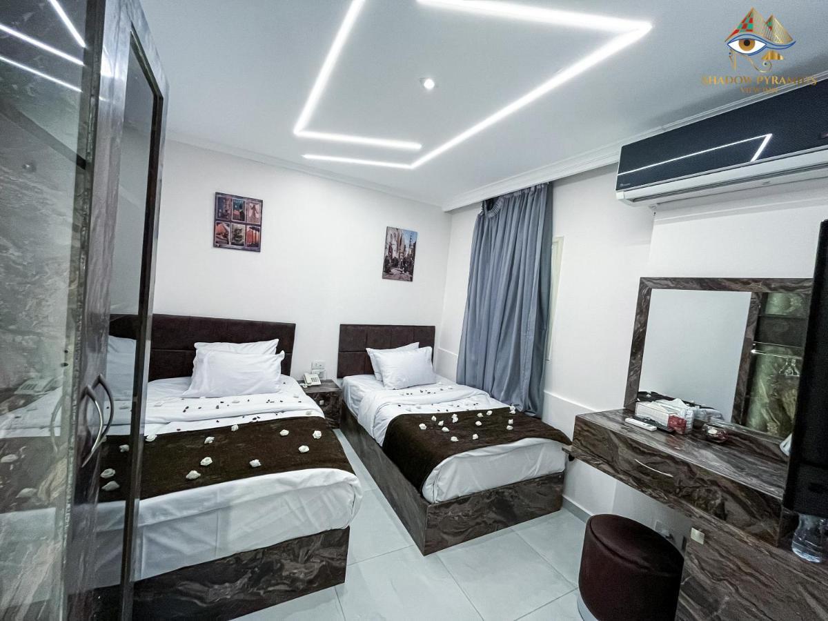 Kafret el-Gabal Shadow Pyramids Suites And Jacuzzi מראה חיצוני תמונה