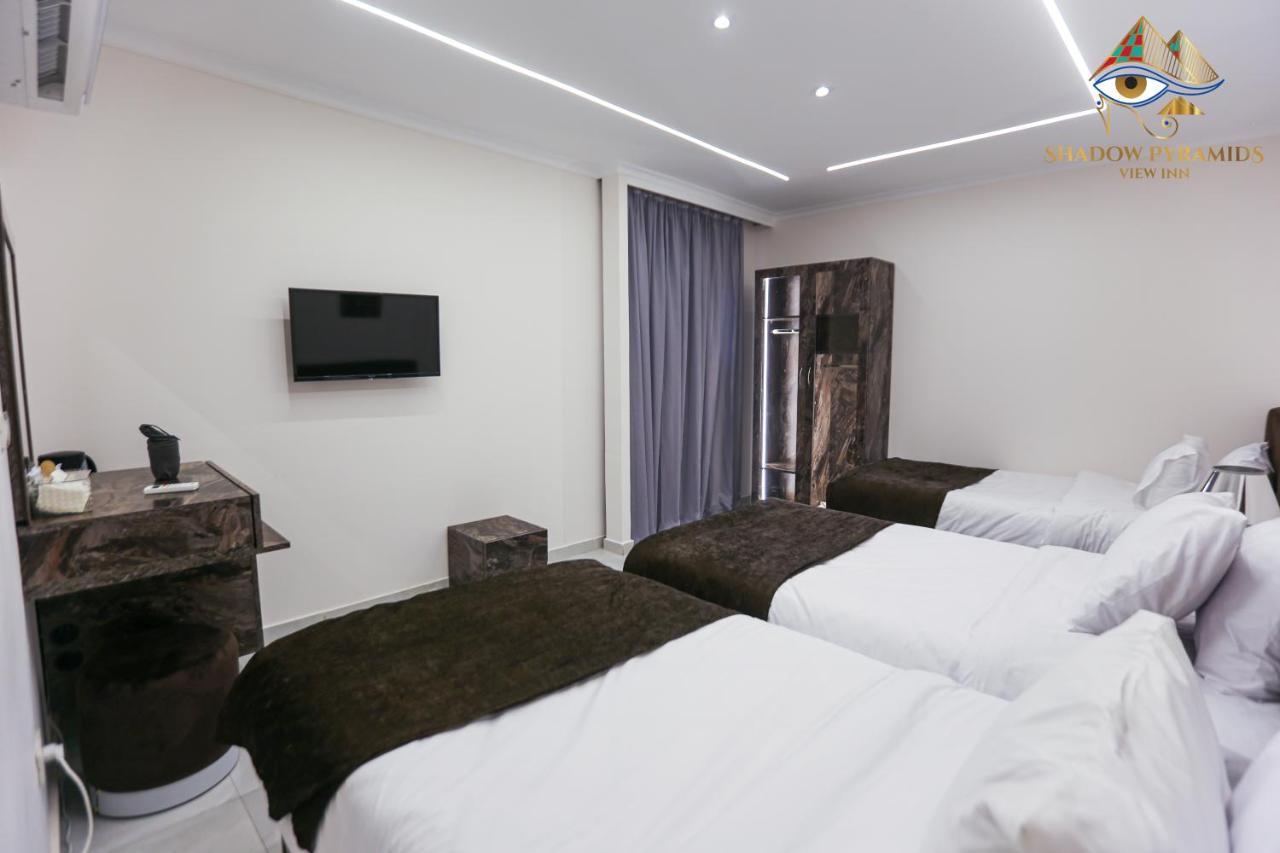 Kafret el-Gabal Shadow Pyramids Suites And Jacuzzi מראה חיצוני תמונה
