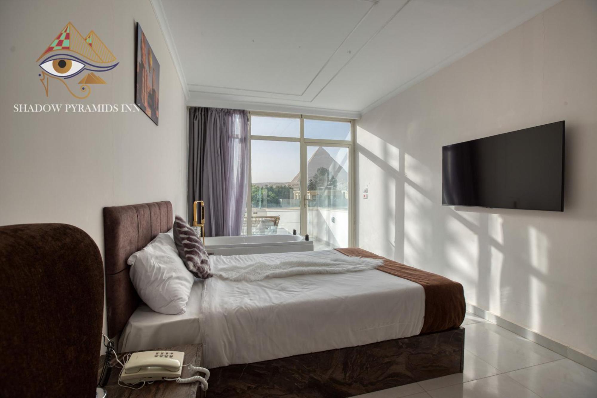 Kafret el-Gabal Shadow Pyramids Suites And Jacuzzi מראה חיצוני תמונה