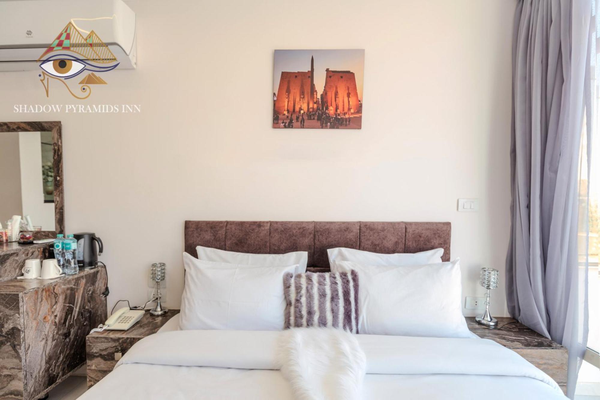 Kafret el-Gabal Shadow Pyramids Suites And Jacuzzi מראה חיצוני תמונה