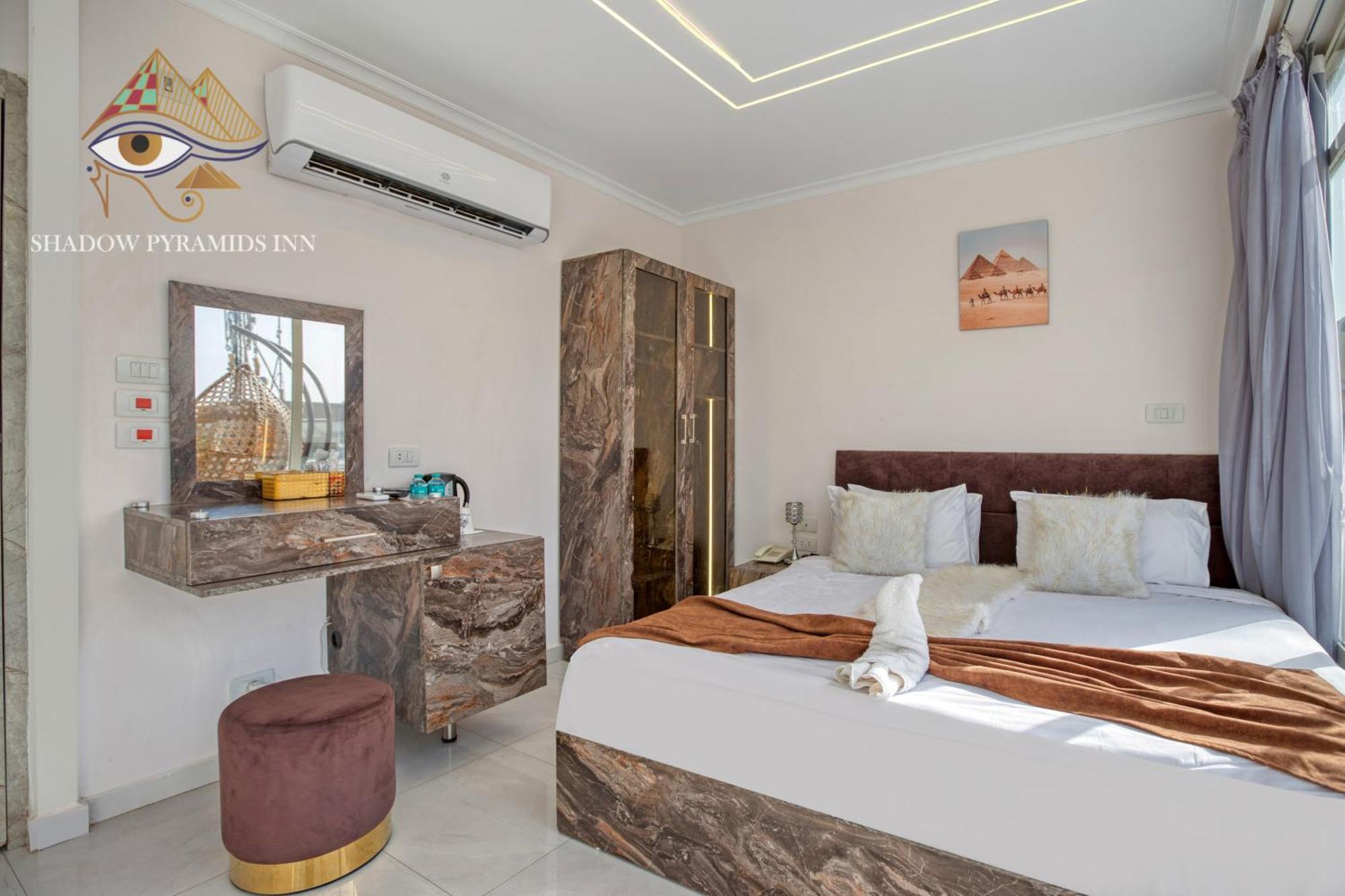 Kafret el-Gabal Shadow Pyramids Suites And Jacuzzi מראה חיצוני תמונה