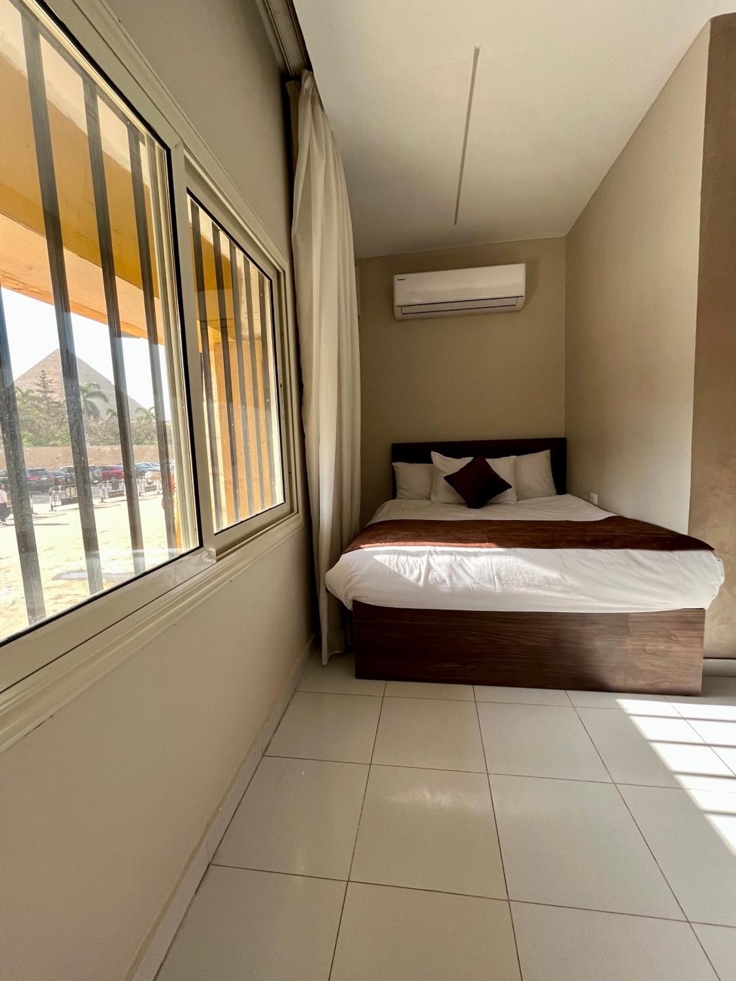 Kafret el-Gabal Shadow Pyramids Suites And Jacuzzi מראה חיצוני תמונה
