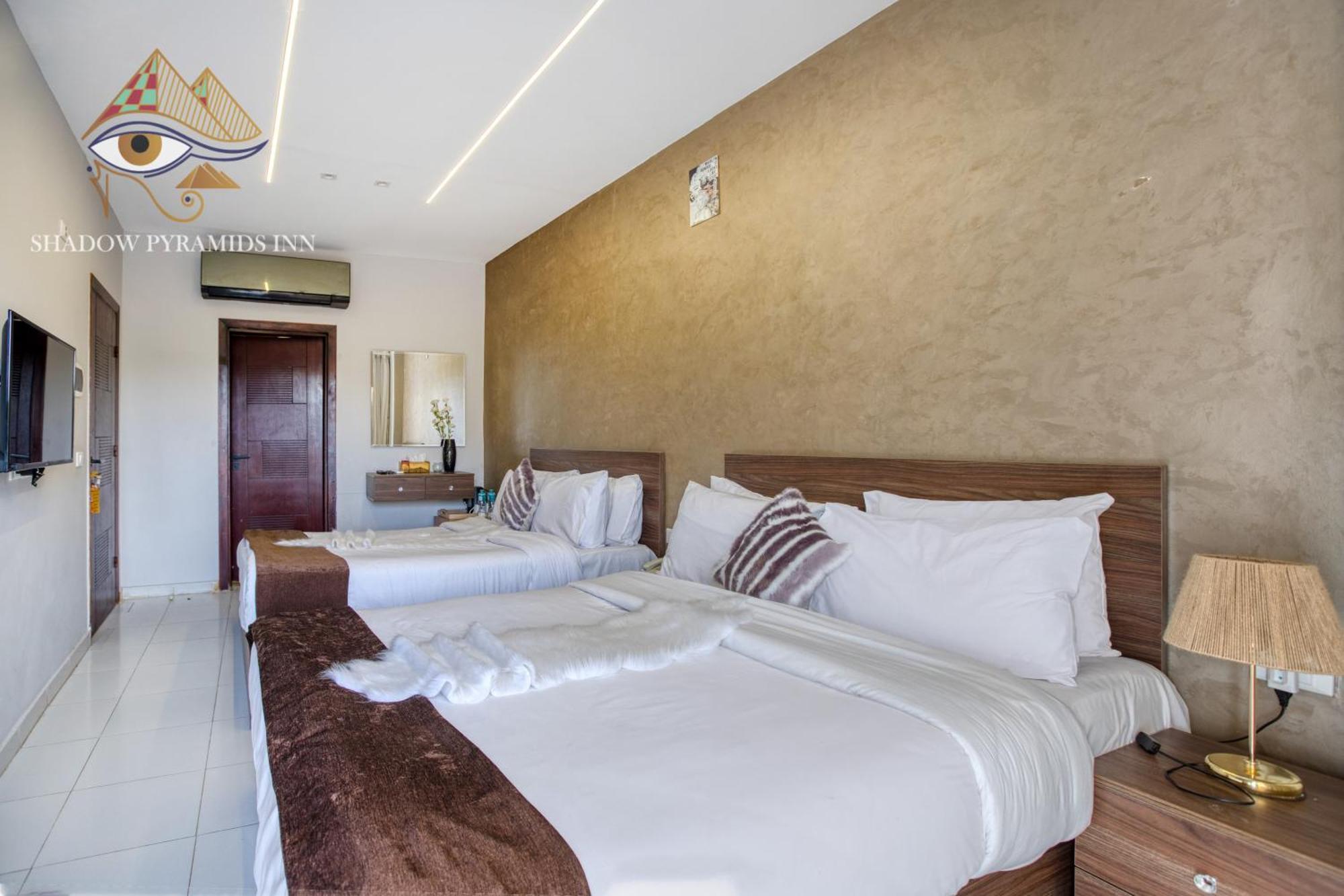 Kafret el-Gabal Shadow Pyramids Suites And Jacuzzi מראה חיצוני תמונה